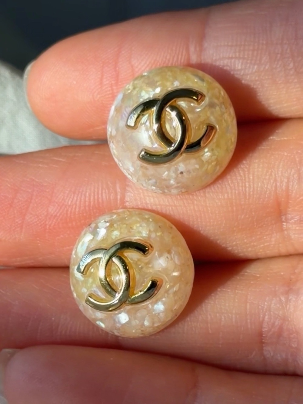 CHANEL Cream Shell CC Button Earrings